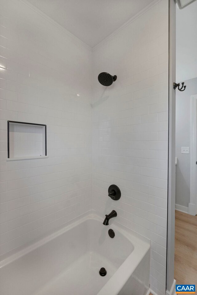 912 Shores Rd, Palmyra, VA 22963 - bathroom with ornamental molding, shower / tub combination, baseboards, and wood finished floors