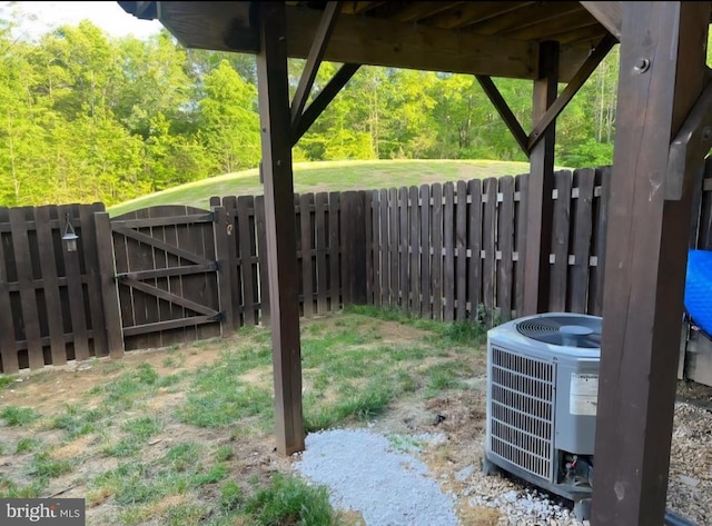 2437 Drake Ln, Fredericksburg, VA 22408 - fenced yard featuring a gate and central air condition unit