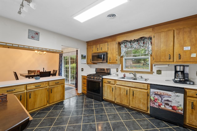 708 Woodside Ln, Waynesboro, VA 22980 - kitchen featuring gas range oven, dishwasher, stainless steel microwave, and decorative backsplash