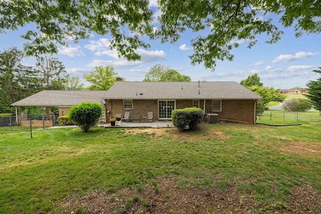 708 Woodside Ln, Waynesboro, VA 22980 - rear view of property featuring a patio, brick siding, and a chimney