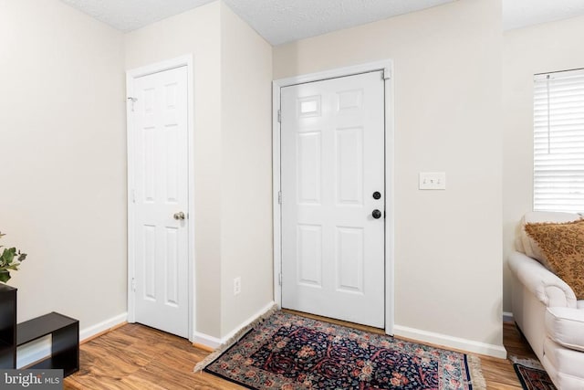 2912 Broyhill Ct, Fredericksburg, VA 22408 - foyer entrance with light wood-type flooring and baseboards