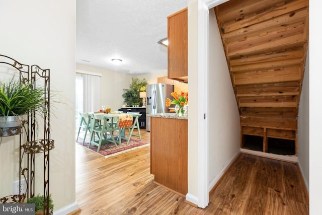 2912 Broyhill Ct, Fredericksburg, VA 22408 - hall with light wood-style flooring and baseboards