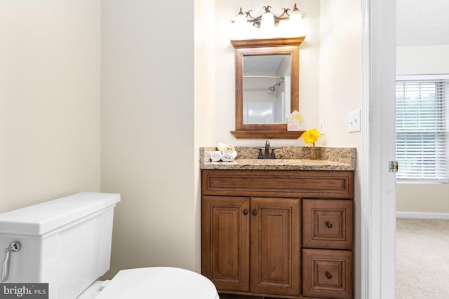 2912 Broyhill Ct, Fredericksburg, VA 22408 - bathroom with toilet, vanity, and baseboards