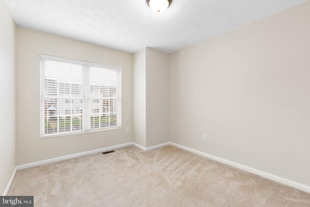 2912 Broyhill Ct, Fredericksburg, VA 22408 - unfurnished room with carpet floors, baseboards, and a textured ceiling