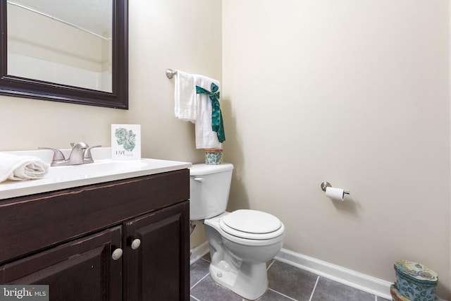 2912 Broyhill Ct, Fredericksburg, VA 22408 - bathroom with tile patterned floors, baseboards, toilet, and vanity