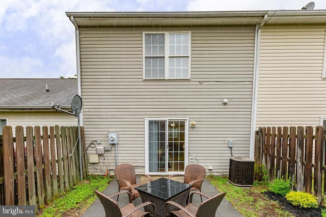 2912 Broyhill Ct, Fredericksburg, VA 22408 - back of house featuring cooling unit and a patio