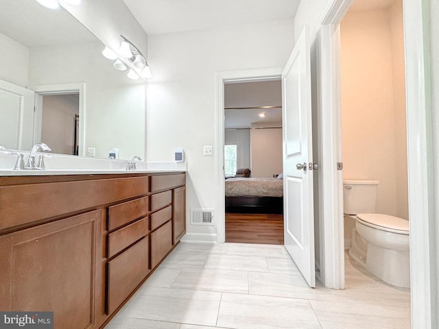 8525 Laroque Run Dr, Fredericksburg, VA 22407 - full bath featuring connected bathroom, double vanity, toilet, and tile patterned flooring