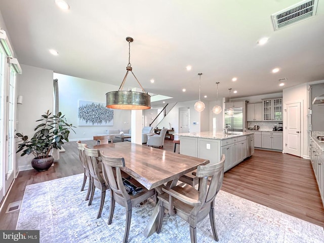 8525 Laroque Run Dr, Fredericksburg, VA 22407 - dining space featuring wood finished floors, baseboards, and recessed lighting