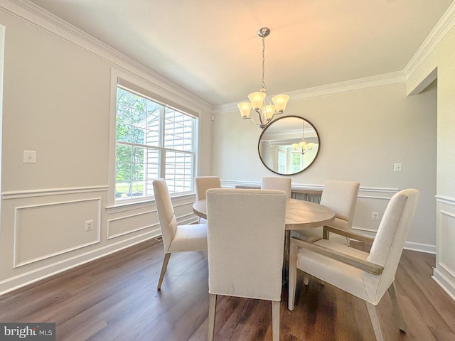 8525 Laroque Run Dr, Fredericksburg, VA 22407 - dining area featuring a chandelier, wood finished floors, crown molding, wainscoting, and a decorative wall