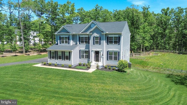 8525 Laroque Run Dr, Fredericksburg, VA 22407 - colonial-style house featuring central air condition unit and a shingled roof