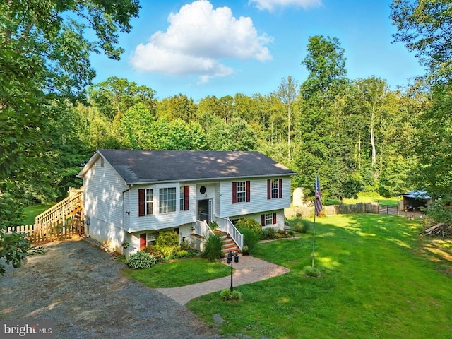 19303 Frazier Rd, Culpeper, VA 22701 - raised ranch featuring a wooded view and roof with shingles