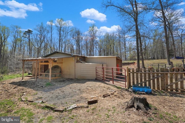 view of outbuilding featuring an exterior structure and an outbuilding