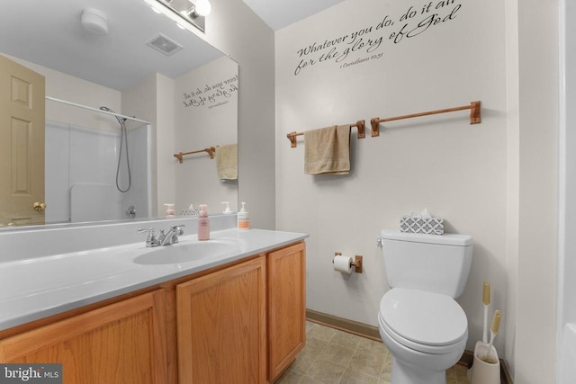full bath with a shower, vanity, toilet, and baseboards