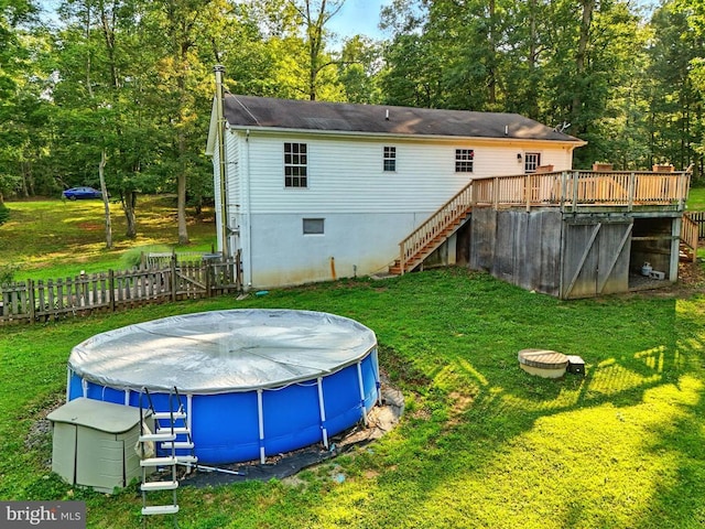 19303 Frazier Rd, Culpeper, VA 22701 - back of house with stairway, a deck, and a covered pool