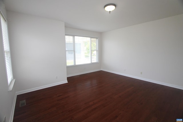 66 Timber Ridge Ln, Zion Crossroads, VA 22942 - empty room with dark wood-type flooring and baseboards