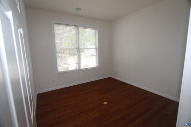 66 Timber Ridge Ln, Zion Crossroads, VA 22942 - empty room with baseboards and dark wood-type flooring