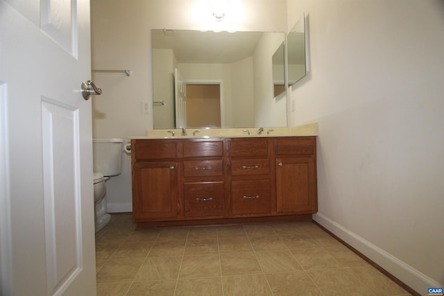 66 Timber Ridge Ln, Zion Crossroads, VA 22942 - bathroom featuring double vanity and tile patterned flooring