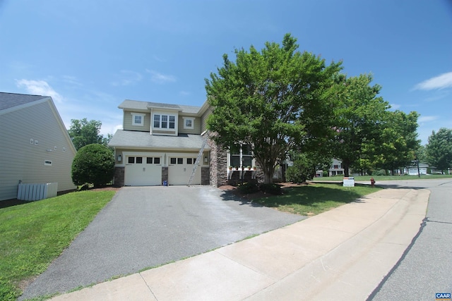66 Timber Ridge Ln, Zion Crossroads, VA 22942 - view of front of house with driveway, a front lawn, and an attached garage