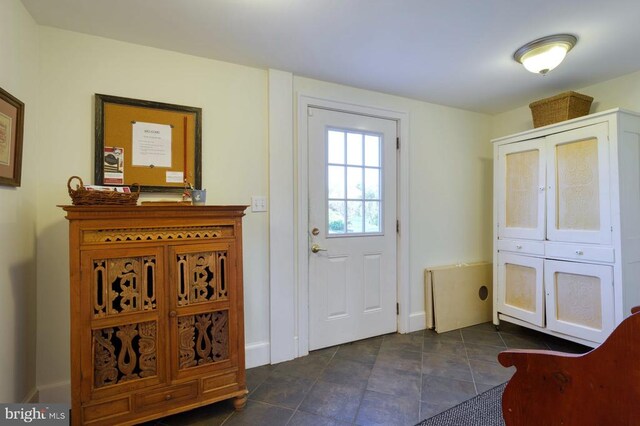315 Ganders Dr, Luray, VA 22835 - doorway featuring baseboards and dark tile patterned flooring