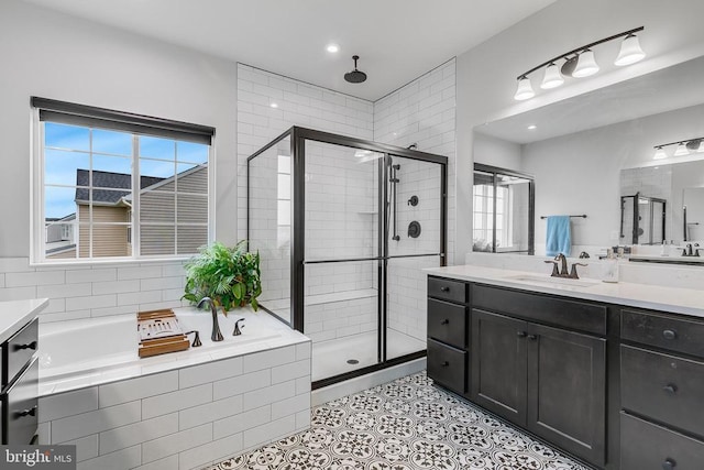 10115 Premier St, Fredericksburg, VA 22408 - full bath featuring a shower stall, plenty of natural light, and vanity