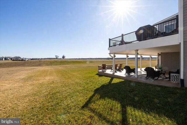 10115 Premier St, Fredericksburg, VA 22408 - view of green lawn with a balcony and a patio