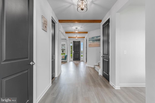 10115 Premier St, Fredericksburg, VA 22408 - entrance foyer with beamed ceiling, light wood-style flooring, baseboards, and stairway