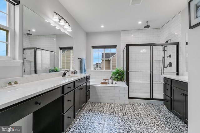 10115 Premier St, Fredericksburg, VA 22408 - bathroom featuring a shower stall, healthy amount of natural light, vanity, and recessed lighting