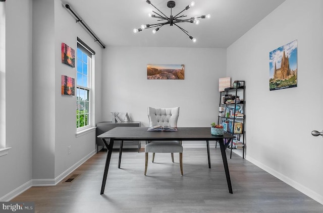 10115 Premier St, Fredericksburg, VA 22408 - office area featuring wood finished floors, baseboards, and a chandelier