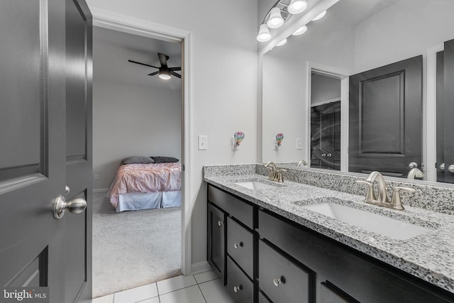 10115 Premier St, Fredericksburg, VA 22408 - ensuite bathroom featuring double vanity, ceiling fan, tile patterned floors, and baseboards