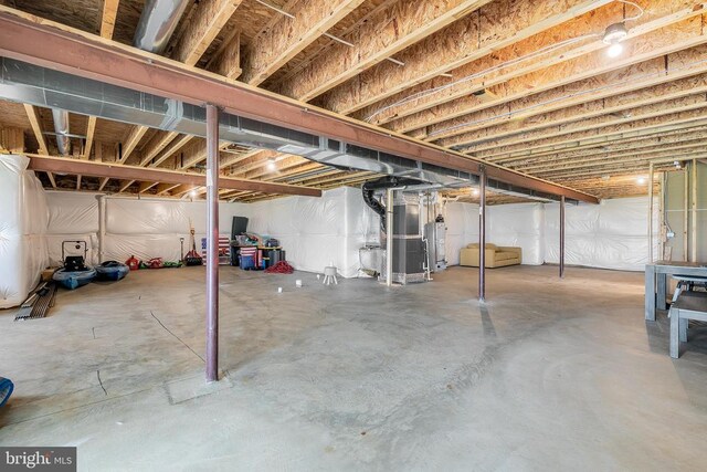 10115 Premier St, Fredericksburg, VA 22408 - unfinished basement with water heater