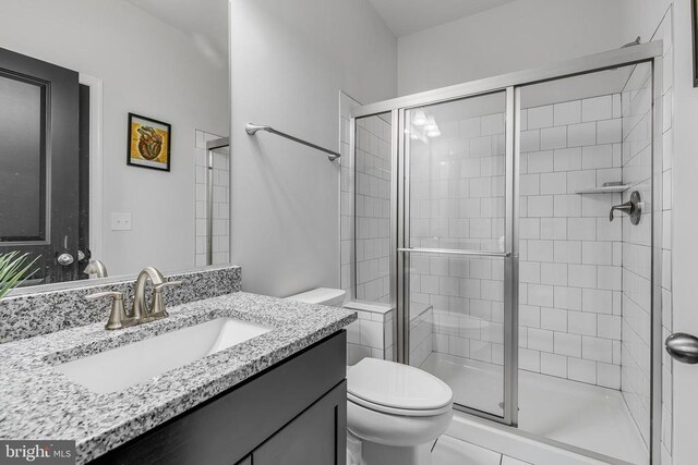 10115 Premier St, Fredericksburg, VA 22408 - bathroom featuring toilet, a shower stall, and vanity