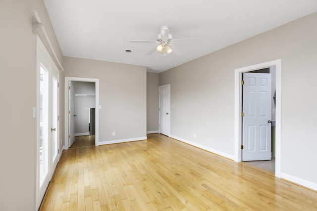 173 Valley View Ave, Mount Sidney, VA 24467 - unfurnished bedroom with light wood-style floors, multiple windows, and baseboards