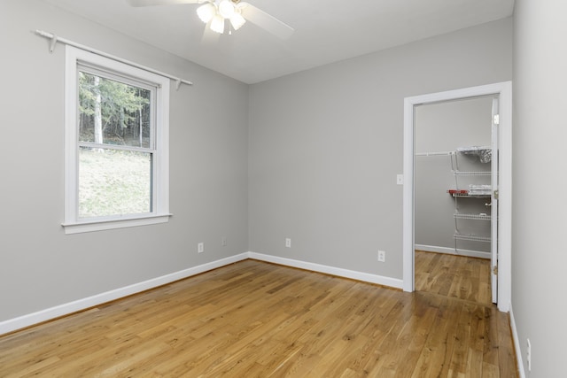 173 Valley View Ave, Mount Sidney, VA 24467 - empty room with light wood finished floors, ceiling fan, and baseboards