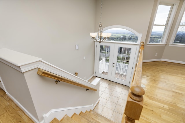 173 Valley View Ave, Mount Sidney, VA 24467 - stairway featuring a chandelier, plenty of natural light, baseboards, and french doors