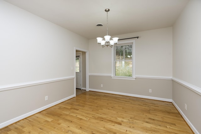 173 Valley View Ave, Mount Sidney, VA 24467 - spare room featuring a chandelier, wood finished floors, and baseboards