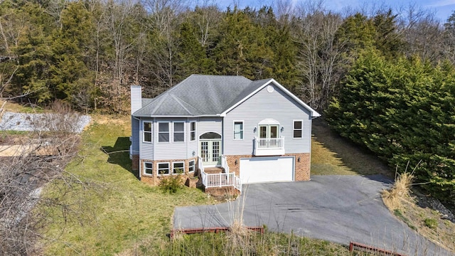 173 Valley View Ave, Mount Sidney, VA 24467 - bi-level home with french doors, a chimney, driveway, brick siding, and a garage