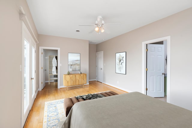 173 Valley View Ave, Mount Sidney, VA 24467 - bedroom with light wood-type flooring, multiple windows, and baseboards