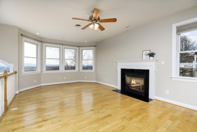 173 Valley View Ave, Mount Sidney, VA 24467 - unfurnished living room featuring a fireplace with flush hearth, a ceiling fan, light wood-style flooring, baseboards, and recessed lighting