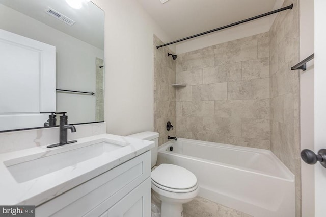 full bathroom with toilet, vanity, and shower / washtub combination