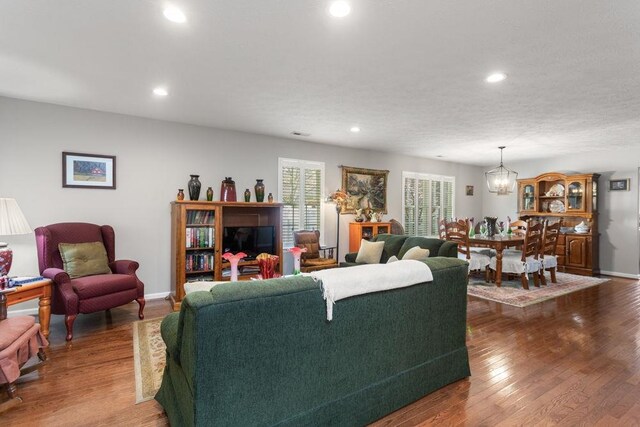 521 Hickory Grove Cir, Harrisonburg, VA 22801 - living room with a chandelier, recessed lighting, dark wood finished floors, and baseboards