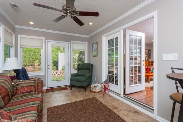 521 Hickory Grove Cir, Harrisonburg, VA 22801 - sunroom with a textured ceiling, tile patterned floors, recessed lighting, and crown molding