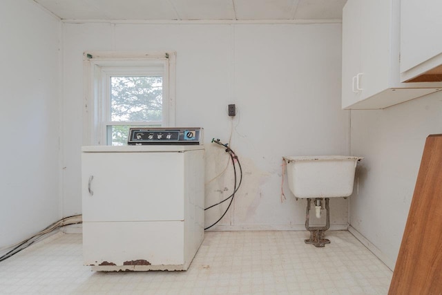 56 Grindstone Rd, Bridgewater, VA 22812 - laundry area with washer / clothes dryer, light flooring, cabinet space, and baseboards