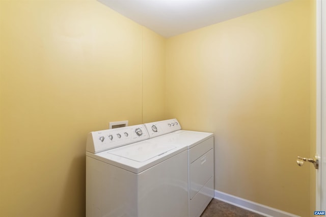112 5th St SE Unit 3D, Charlottesville, VA 22902 - washroom with washer and clothes dryer and baseboards