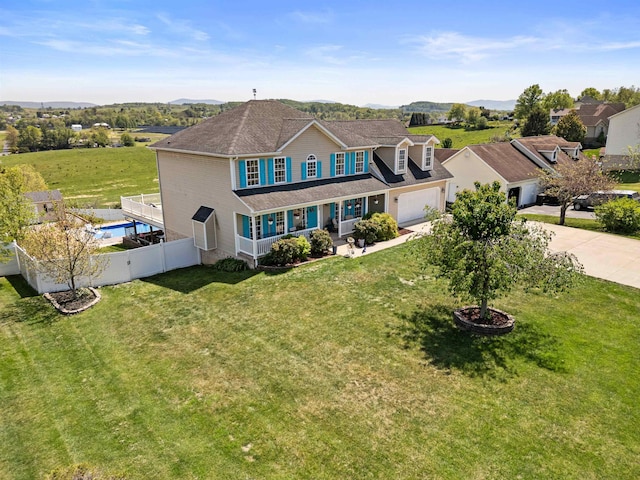 23 Joy Ln, Fishersville, VA 22939 - view of front of house with covered porch, concrete driveway, a garage, and a mountain view