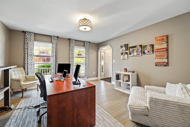 23 Joy Ln, Fishersville, VA 22939 - office area with arched walkways, light wood-style flooring, and baseboards