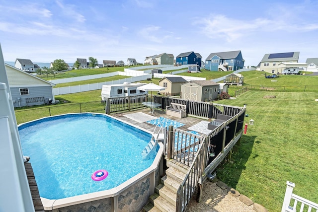 96 Lofty Cir, Stuarts Draft, VA 24477 - view of swimming pool with a shed, a residential view, and a wooden deck