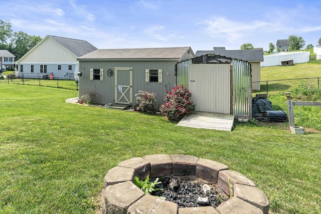 96 Lofty Cir, Stuarts Draft, VA 24477 - rear view of property with a fire pit, a storage shed, and a fenced backyard
