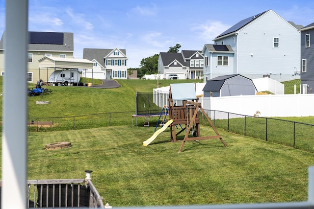 96 Lofty Cir, Stuarts Draft, VA 24477 - fenced backyard with a playground, a residential view, and a trampoline
