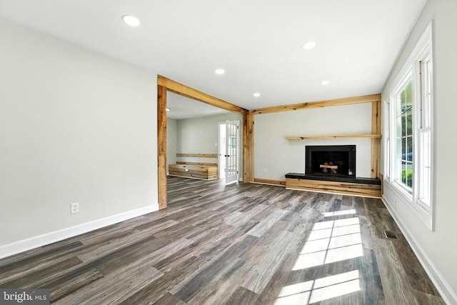9377 General Winder Rd, Rapidan, VA 22733 - unfurnished living room featuring wood finished floors, recessed lighting, plenty of natural light, and a fireplace with raised hearth