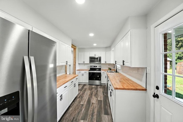 9377 General Winder Rd, Rapidan, VA 22733 - kitchen with butcher block countertops, stainless steel appliances, healthy amount of natural light, dark wood-type flooring, and recessed lighting